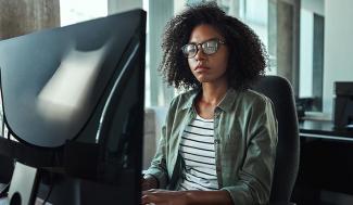 Young woman working at computer